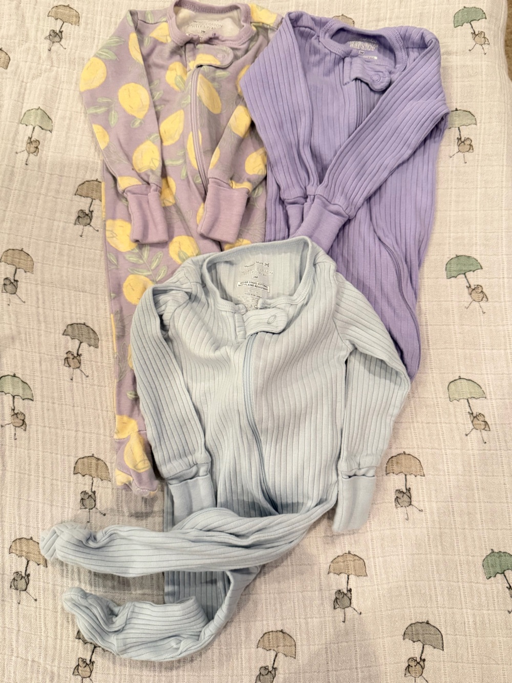 Bundle of 3  Baby Ribbed Footed Pajamas Set in Lavender, Blue & lemon print EUC